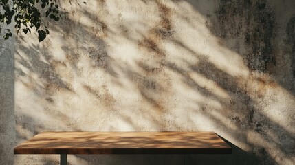 Poster - Minimalist wooden table beside a textured wall with soft shadows creating a serene and rustic atmosphere. Ideal for interior design inspiration.