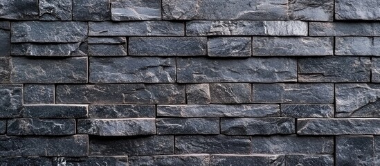 Poster - Textured slate stone wall background suitable for contemporary design projects and creative cover page applications