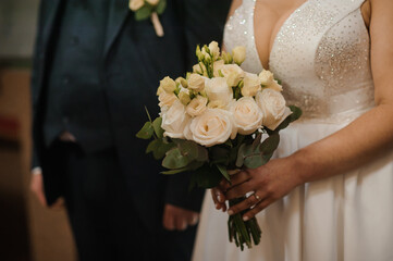 Wall Mural - Elegant Wedding Bouquet and Bride in Bridal Gown