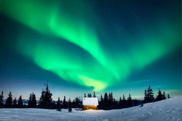 Wall Mural - tiny wooden cabin under incredible northern lights in snowy forest. christmas holiday and winter vac