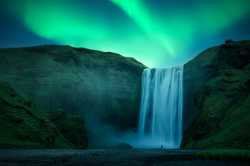 Wall Mural - aurora borealis over famous skogafoss waterfall on skoga river, iceland. gorgeous icelandic landscap