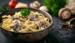 © Mahmud Creative - Pasta with mushrooms and cream sauce in bowl on table close up