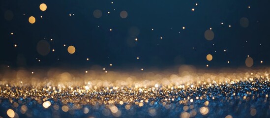 Poster - elegant blue background with golden glitter particles creating a luxurious atmosphere and ample empt