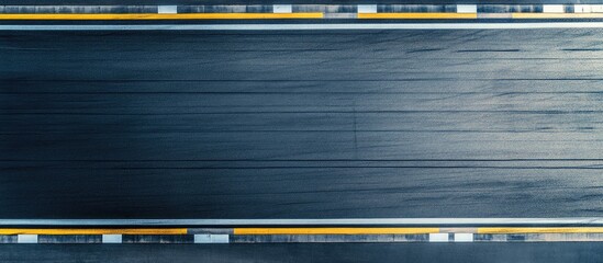 Poster - Aerial view of an empty racetrack featuring painted lines on asphalt ideal for overlaying text or graphics