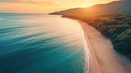 Poster - Aerial Sunset View of Serene Beach with Lush Green Mountains and Tranquil Waters Perfect for Text Placement and Nature-Themed Designs