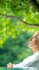 Wall Mural - A man in a bathrobe sitting in a pool with his eyes closed