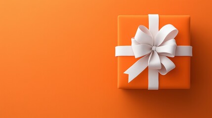 Wall Mural - Elegant gift box with white ribbon on vibrant orange background