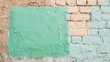 © DigitalSpace - A textured view of the wall where a square of soft mint green paint has been applied emphasizing the blend of colors with the raw unfinished backdrop.