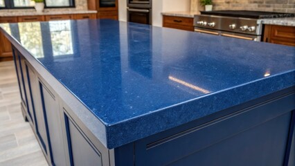 Poster - A rich deep blue countertop made of solid surface material showcasing flawlessly exeed angular s capturing the play of light and shadow across its surface.