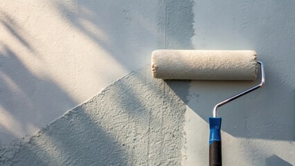 Aufkleber - An intricate shot of the subtle variation in the freshly applied primer showing slight shadows and highlights coupled with a roller that carries the promise of a completed