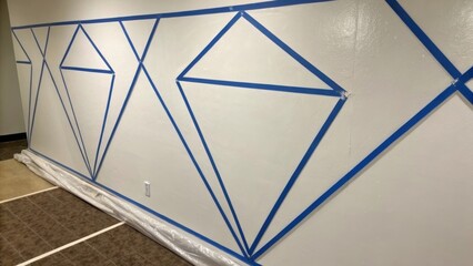 Aufkleber - A closeup shot where areas of painters tape lie in stark contrast with the wall some segments meticulously aligning to create a diamond shape almost like a hidden gem amidst the
