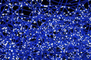 Poster - Twinkling Blue Lights on Twisted Wire Background for Abstract Art