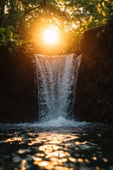 Wall Mural - A waterfall with a sun shining on it. The water is clear and the sun is bright