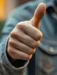 © MK - Person Giving Thumbs Up Close-Up