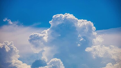 Wall Mural - Time lapse of fluffy white clouds in clear blue sky, white cloud cloudscape, view from above, sunny, copy space, static, Crete, Greece, plane passes at the end