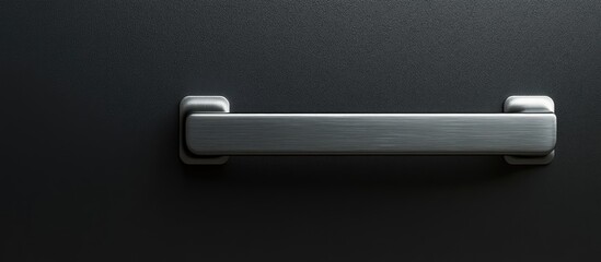Poster - close up of a sleek metallic carry handle on a dark background with ample space for text or branding