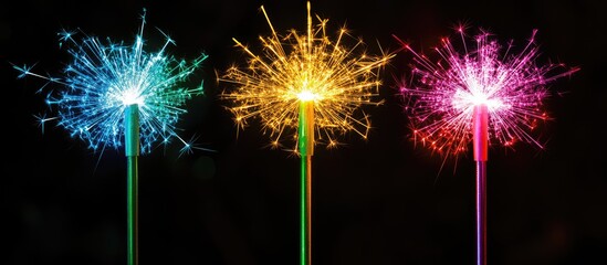 Aufkleber - Colorful festive sparklers illuminating the darkness with vibrant light against a black backdrop creating a magical celebratory atmosphere