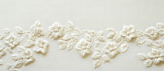 Poster - Elegant embroidered floral silk texture on ivory fabric with smooth weave and empty space for text or design elements.