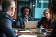 © Alexei - Business people are sitting around a table for a meeting