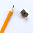 © JELENA - A pencil is next to a pencil sharpener