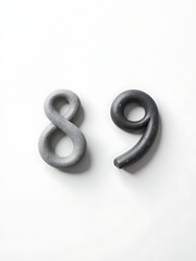 Aufkleber - Two Small Stones Number Eight And Nine Are Isolated On A Plain White Background To Create A Minimalist Design. 00001