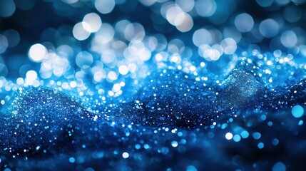 Leinwandbilder - Abstract blue glitter texture with bokeh lights, resembling sparkling waves or sand dunes.