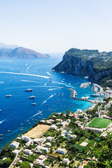 Yacht and boat traffic in the port of Capri, Italy on summertime.