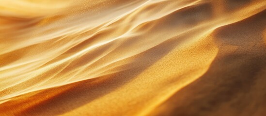 Aufkleber - Soft waves on golden sand creating a serene and warm atmosphere perfect for beach-themed designs and tranquil backgrounds.