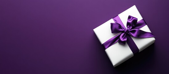 Aufkleber - Elegant white gift box with purple ribbon on a lilac background providing ample copy space for holiday or special occasion messages