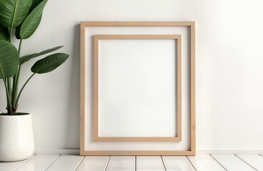 Poster - Empty wooden picture frames on white wall. Natural light, minimalist style. Interior design concept. Suitable for art display. Blank frames. Ideal for presentation of artwork photos. Modern home