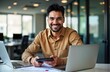 © Pete - Happy Hispanic man working in office. Pro accountant uses calculator, paperwork. Smiling, looking at camera. Sits at desk with laptop, documents. Modern workplace. Financial expertise. Businessman