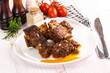 © Andrei Starostin - Prepared tasty beef ribs with sauce