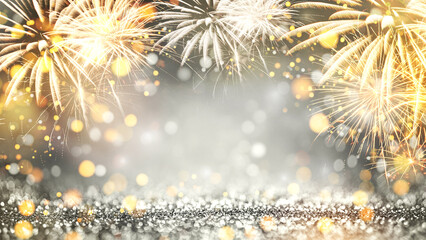 Wall Mural - bright gold golden and silver fireworks sparkle and bokeh with christmas stars lights in new year ev
