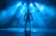 © tongpatong - In a striking blue-lit ring, a boxer's muscular silhouette represents strength, willpower, and the spirit of competitiveness.