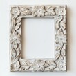 © Andrew - Ornate Floral Frame: A square, off-white wooden picture frame intricately carved with floral designs, providing a sophisticated and elegant border for your cherished memories.