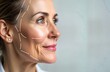 © miss irine - Mature woman profile view. Lines illustrate potential cosmetic enhancement areas. Assessment of facial anatomy for rejuvenation, wrinkle reduction. Aesthetic procedures planning, possibilities shown