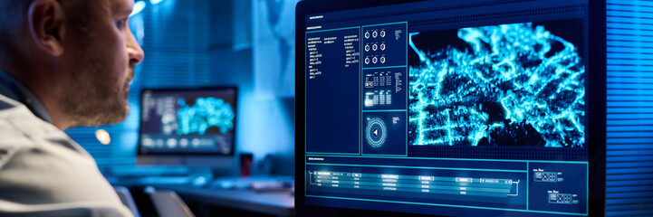 Aufkleber - Header of computer monitor with army location and mature operator of military office sitting in front of screen with graphic data