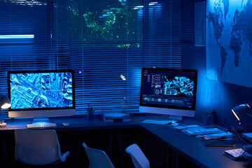 Aufkleber - Part of secret service office with two computer screens with location data on workplaces of modern officers or operators