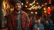 © Purnomo adi - Smiling man in beanie and plaid shirt at a bar.