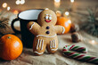 © ADDICTIVE STOCK - Festive gingerbread man cookie with holiday decor and mug