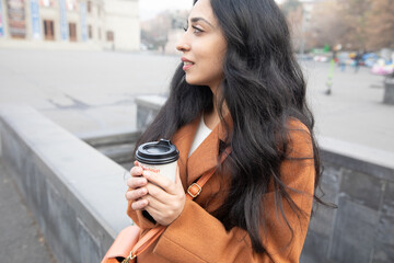 Sticker - woman with coffee cup in city street