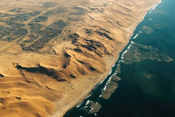 Wall Mural - aerial photography of sand dunes and a body of water, great for travel or nature related concepts