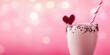 © Anastasia - A minimalistic close-up of a delicious pink milkshake topped with chocolate, adorned with a sparkling heart and a striped straw against a soft pink bokeh background
