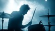 © Jakub - Dramatic drummer performance with dynamic stage lighting