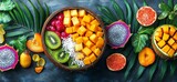 Tropical fruit salad in a wooden bowl with mango, kiwi, dragon fruit, and grapefruit slices.
