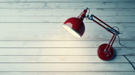 Poster - stylish red desk lamp with adjustable arm on wooden surface