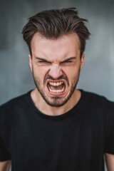 Canvas Print - A bearded man is passionately shouting, showcasing anger and intensity in his facial expression and posture.