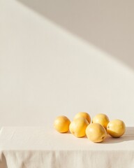 Aufkleber - minimalistic still life of white fruits on table in soft light
