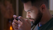 © Yuliia - Caucasian man using mobile phone smartphone telephone gadget online virtual game playing glued stuck addiction male guy evening digital device cyber tapping scrolling connected electronic bedroom bed