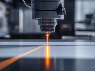 Aufkleber - Close-up of laser cutting machine head precisely cutting a metal sheet.